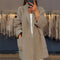 Gilet en tricot "Brigitte" – À poches