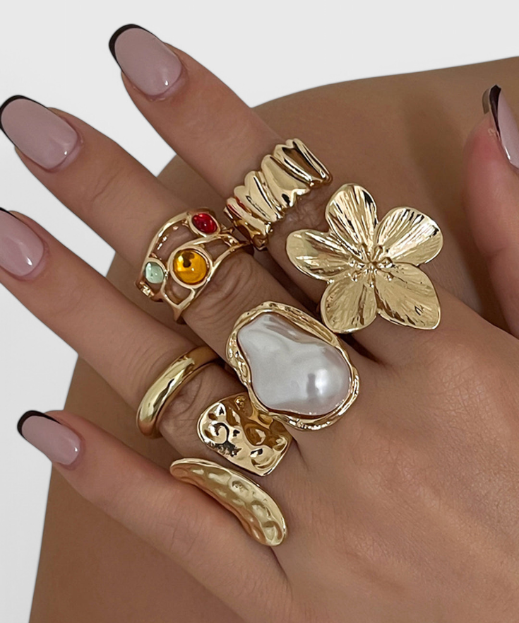 Bague ouverte – Fleur fluide et perle