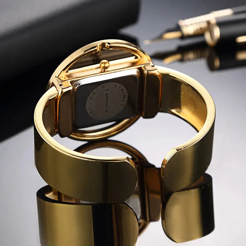 Horloge "Dristig" – Zwart & Goud