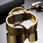 Horloge "Dristig" – Zwart & Goud