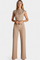 Mouwloze Jumpsuit – Uitlopende Pijpen & Hoge Kraag